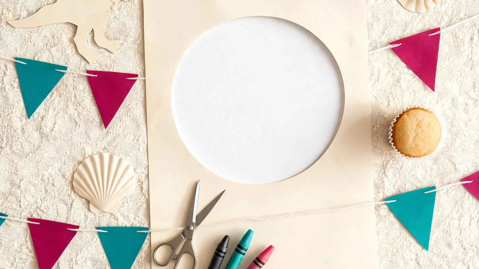 A blank cream poster with an empty circle, a paper dinosaur cut-out, shell cut-outs, teal and magenta flags on string, scissors, crayons, and a plain cupcake. Illustrative image.